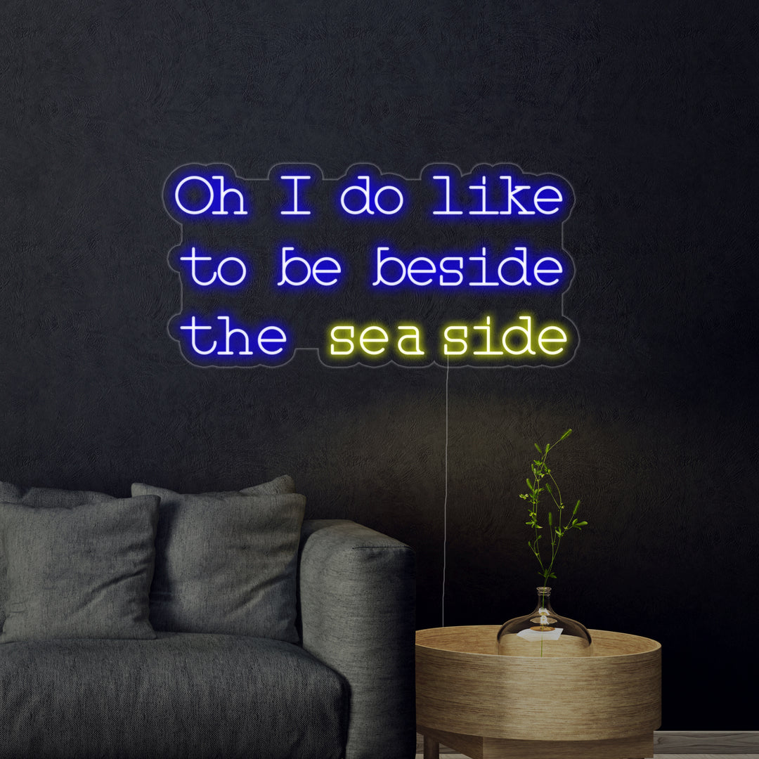 "Oh I do like to be beside the seaside" Letreros Neon
